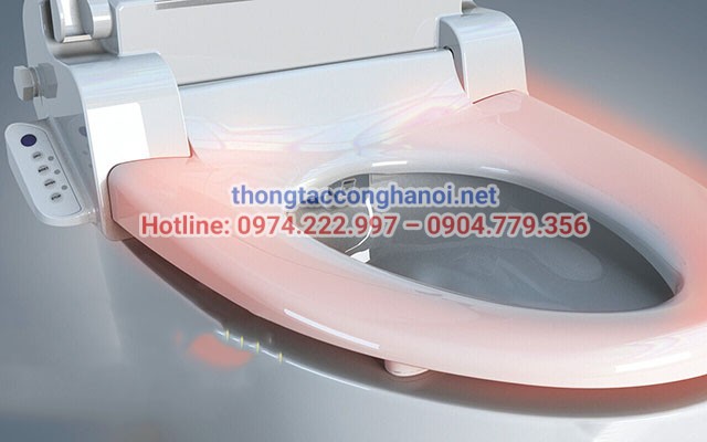 Tháo nắp bồn cầu Inax điện tử